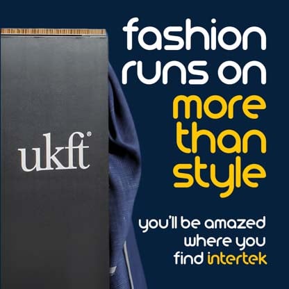 A piece of blue fabric behind a panel labeled UKFT